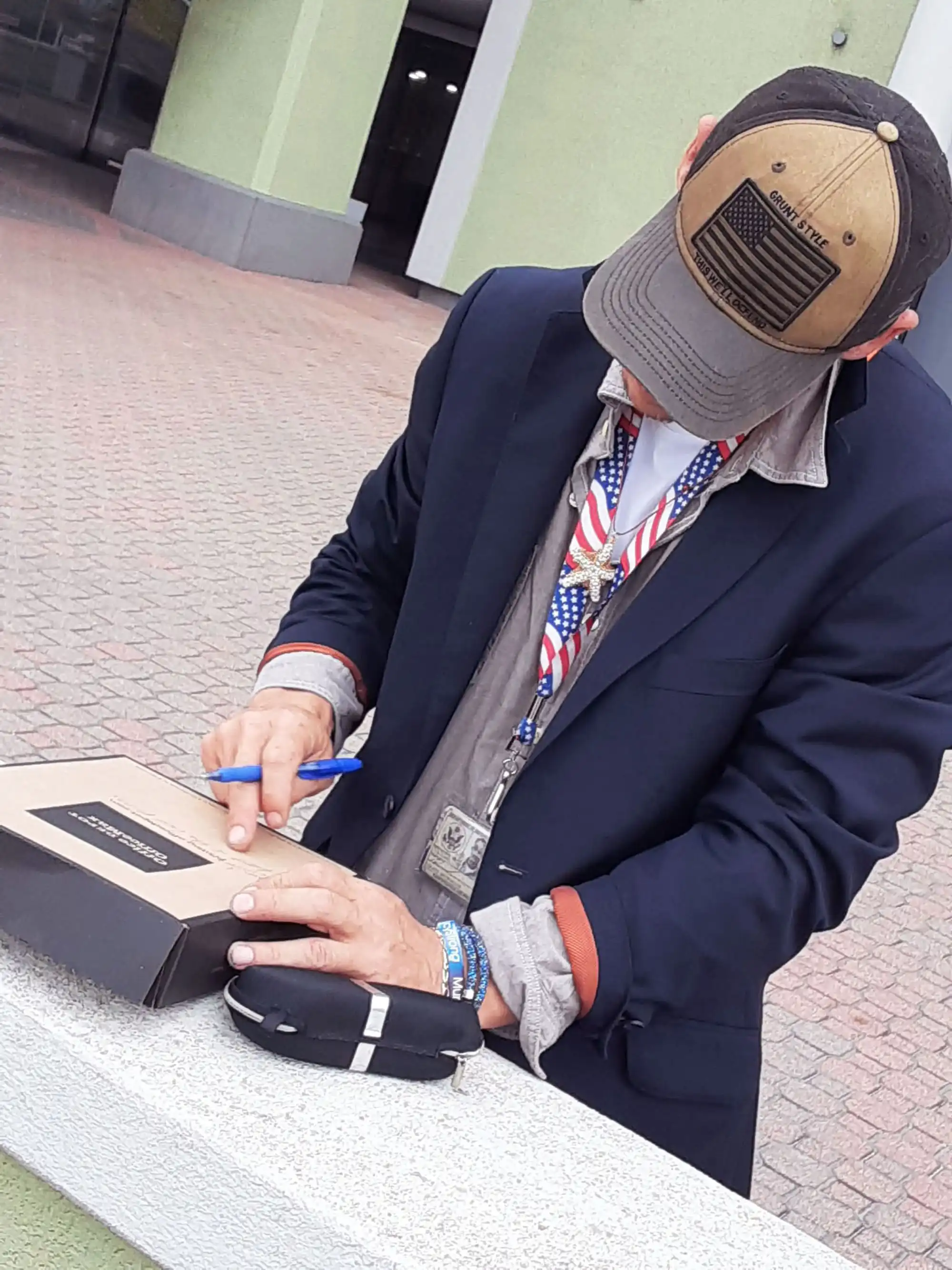 Author David Haave signing his original manuscript to Danny's Dream Bus, Atlantis.